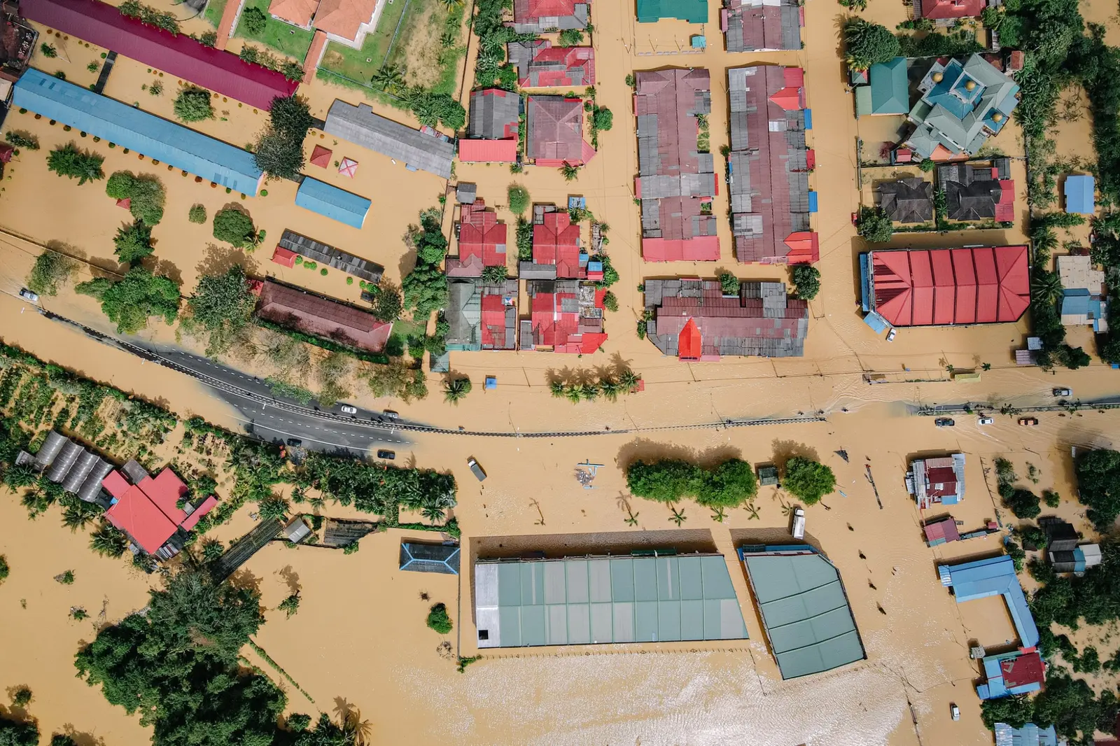 Floodwater covering streets in a dense neighbourhood